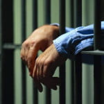 Man Behind Bars