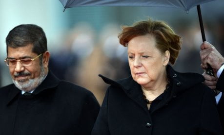 GERMANY-EGYPT-POLITICS-UNREST-DIPLOMACY-MERKEL-MORSI