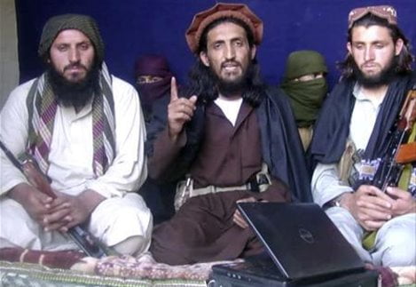 In this image taken from a video recording, Pakistan Taliban commander, gives an interview in Pakistan's Mohmand tribal region