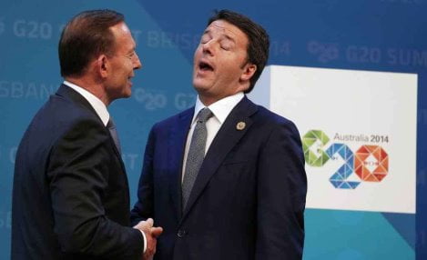 Australian Prime Minister Tony Abbott shakes hands with Italian Prime Minister Matteo Renzi as he officially welcomes leaders to the G20 summit in Brisbane