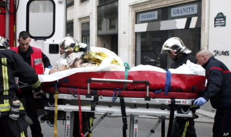 APTOPIX France Newspaper Attack