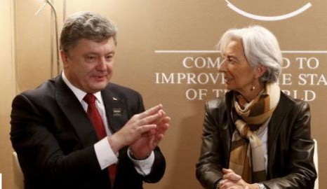Lagarde, head of the International Monetary Fund (IMF) meets with Ukrainian President Poroshenko in the Swiss mountain resort of Davos