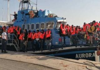 migranti Aurora