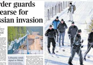 Guardie finlandesi al confine con la Russia