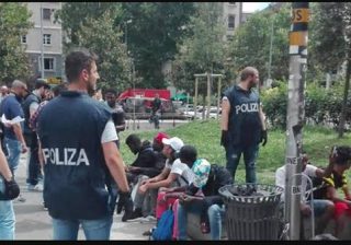migranti polizia